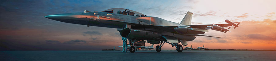 a jet on the runway during sunset