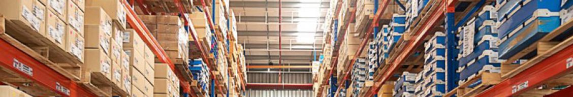 distribution-center forklift moving pallets in a warehouse